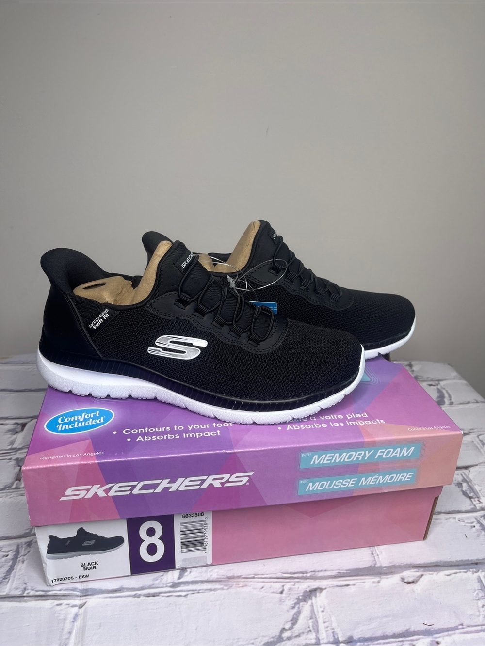 Skechers Black and White Slip-On Memory Foam Sneakers